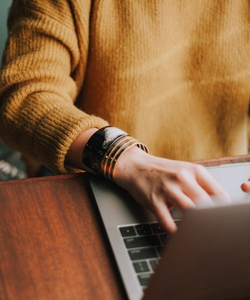 person using laptop computer